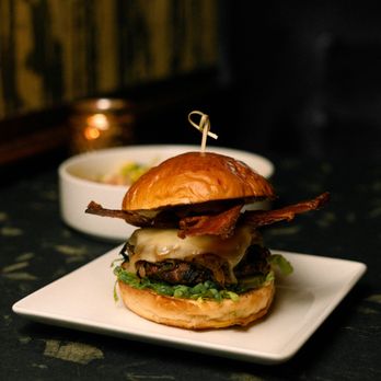 The East End signature dishes Bacon CheeseburgerPopcorn ChickenDuck Reuben